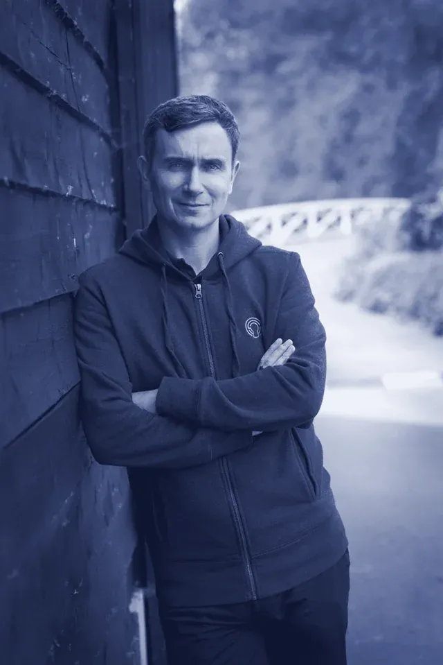 Matt Smallman leaning against a wall, arms folded